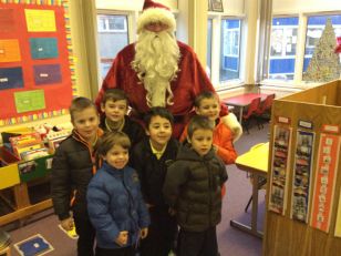 Santa delivered his letter replies to the children in Miss Douglas' Class today........